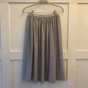 Grey tulle knee length skirt.